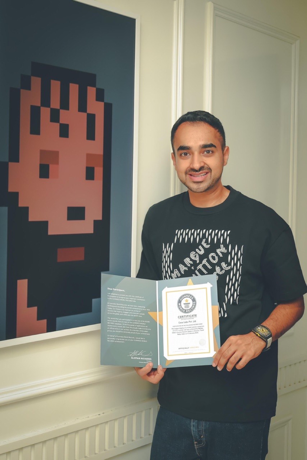 Evan Luthra holding his Guinness World Records certificate
